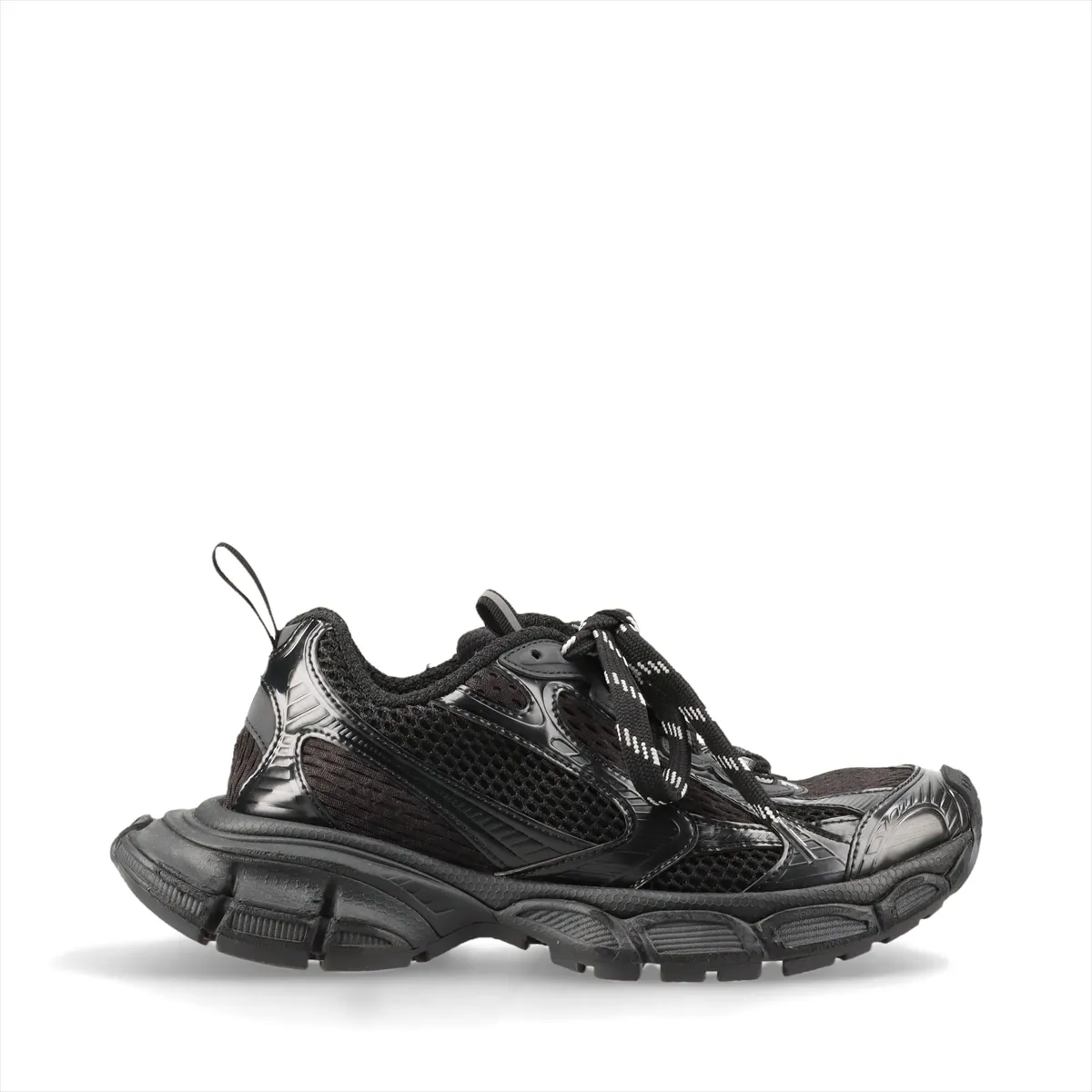 Oversized black chunky sneaker with mesh panels and a thick heavily textured sole.