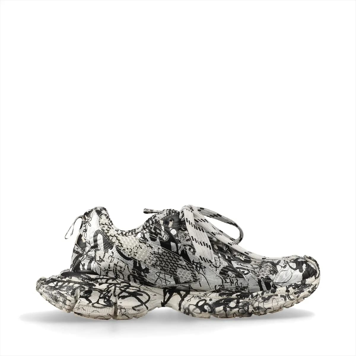 Oversized chunky sneaker in black with silver graffiti-style all-over print and mesh panels.