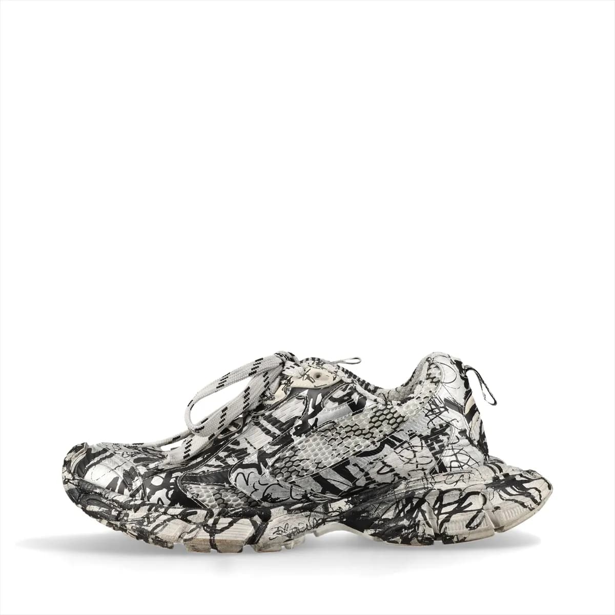 Oversized chunky sneaker in black with silver graffiti-style all-over print and mesh panels.
