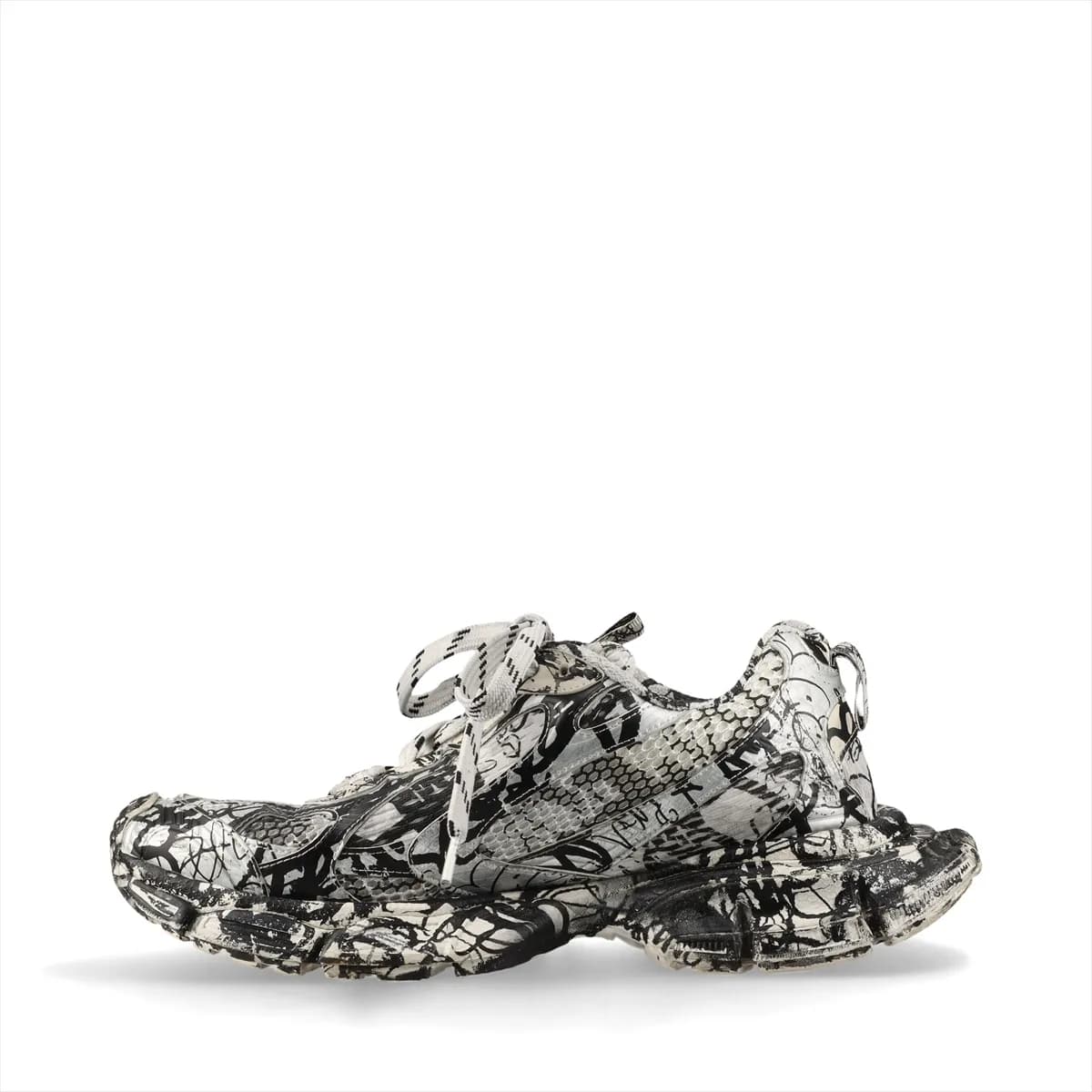 Oversized chunky sneaker in black with silver graffiti-style all-over print and mesh panels.