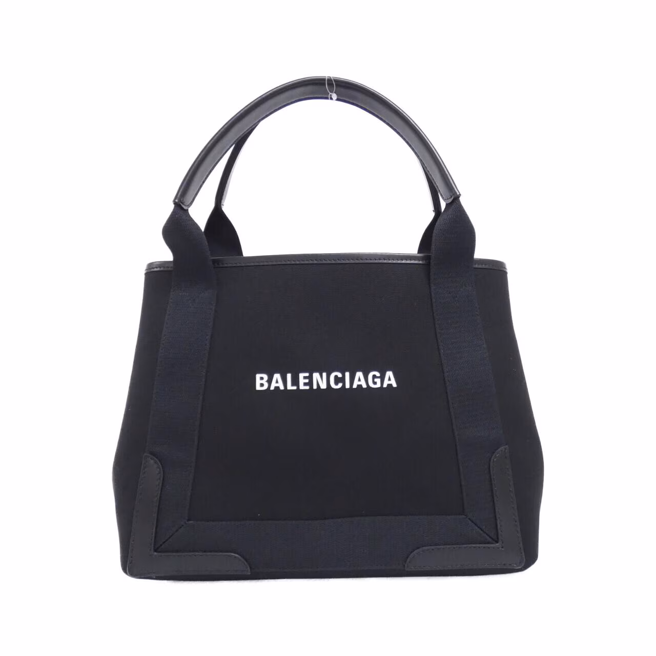 Small structured tote with rolled handles and open top, shown upright on a white background