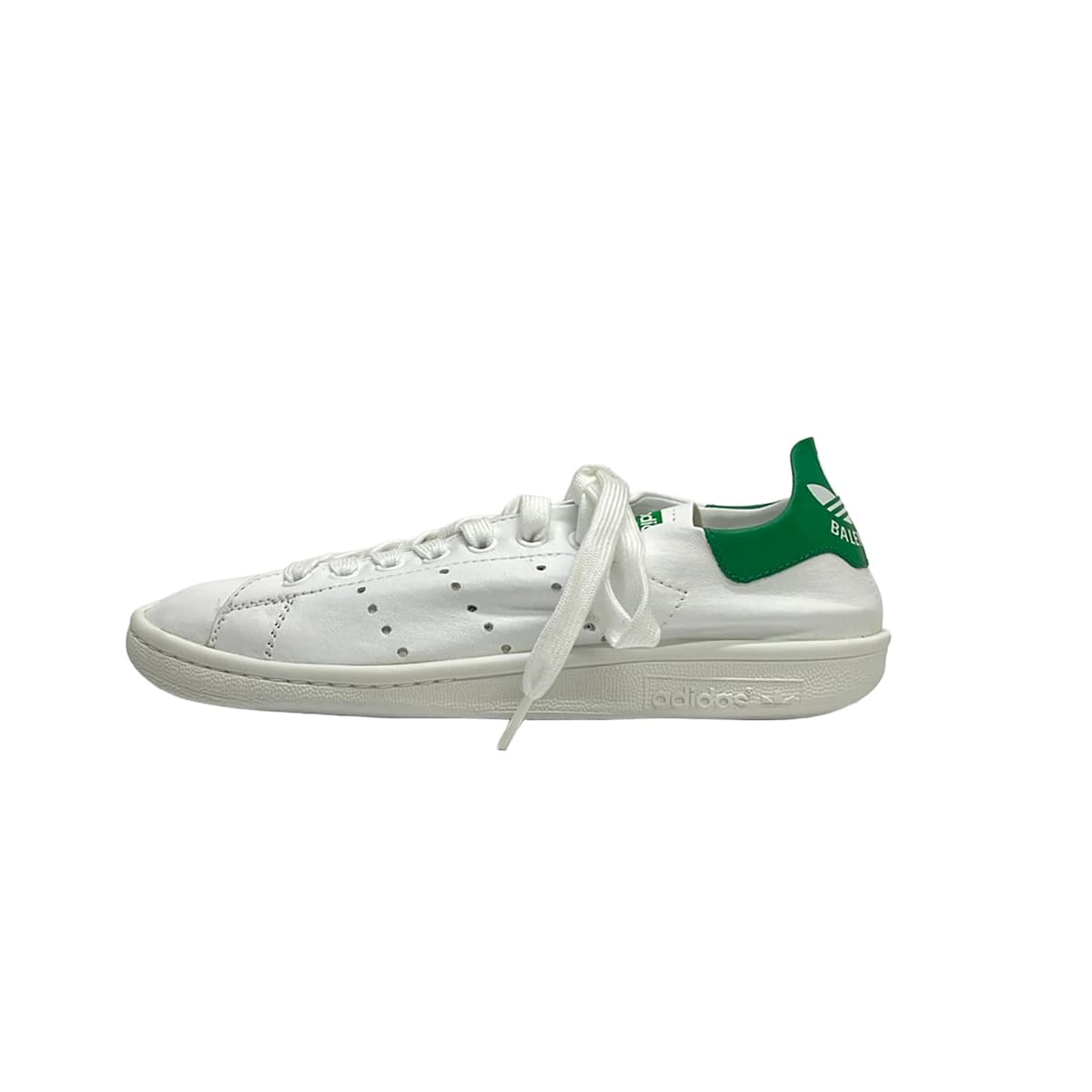 Low-top lace-up shoe photographed on a plain background.