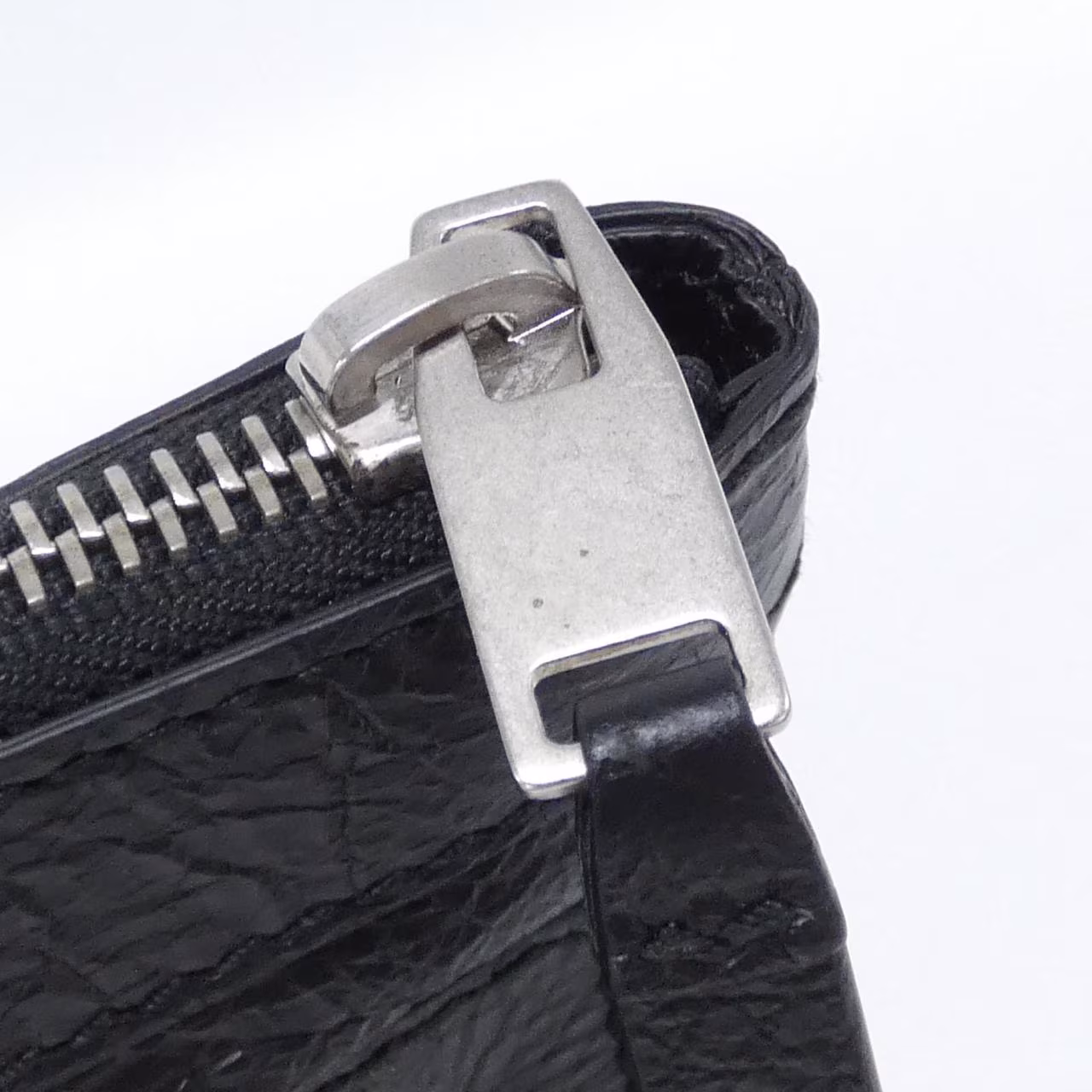Clutch-style bag photographed against a plain background.