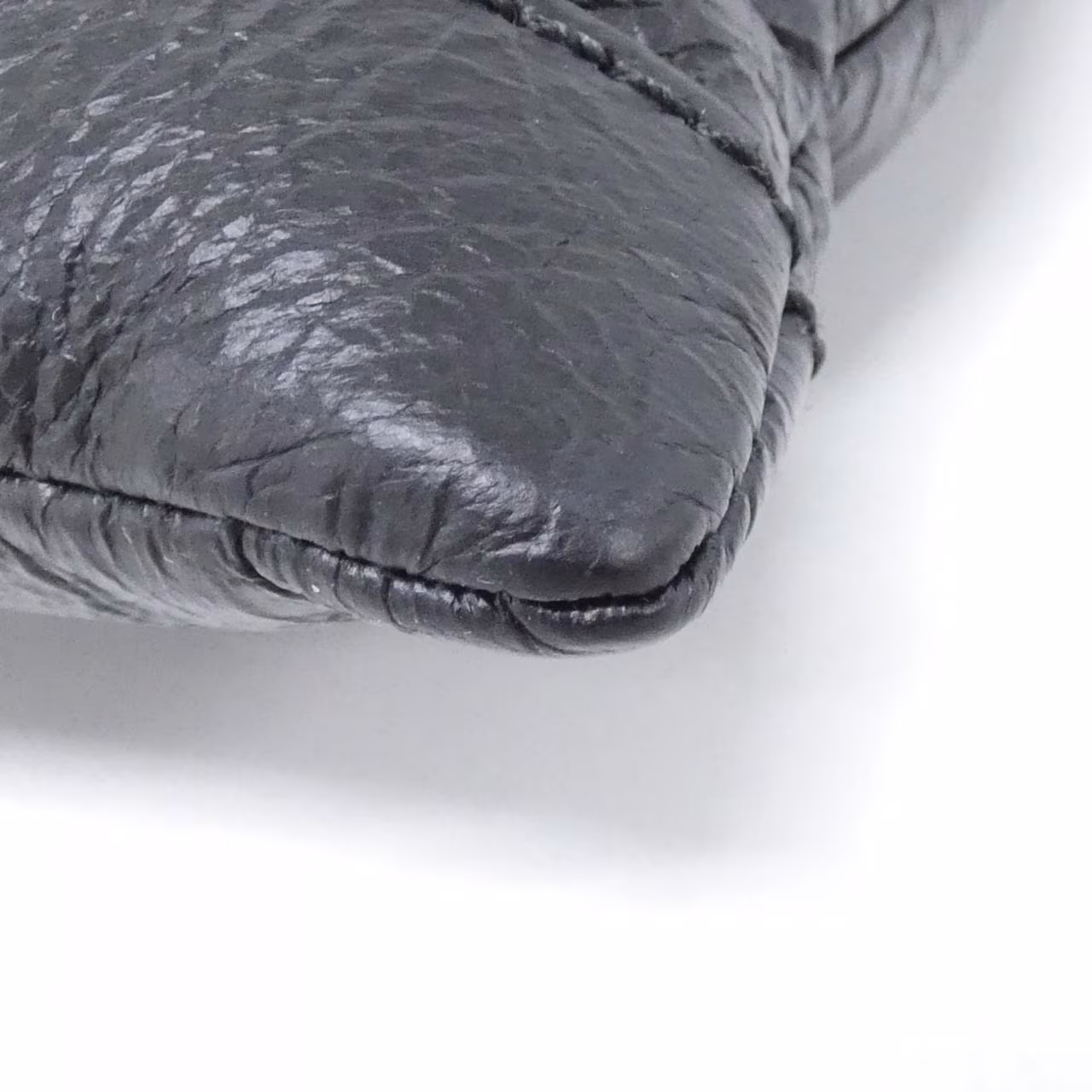 Clutch-style bag photographed against a plain background.