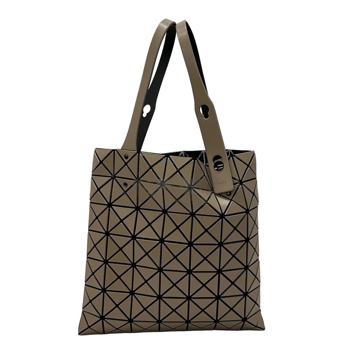 Tote bag built from geometric triangular panels in beige and black.