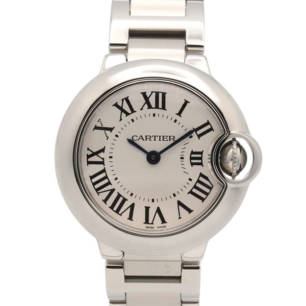 Product photograph of a round steel watch with a blue cabochon crown on a steel bracelet.