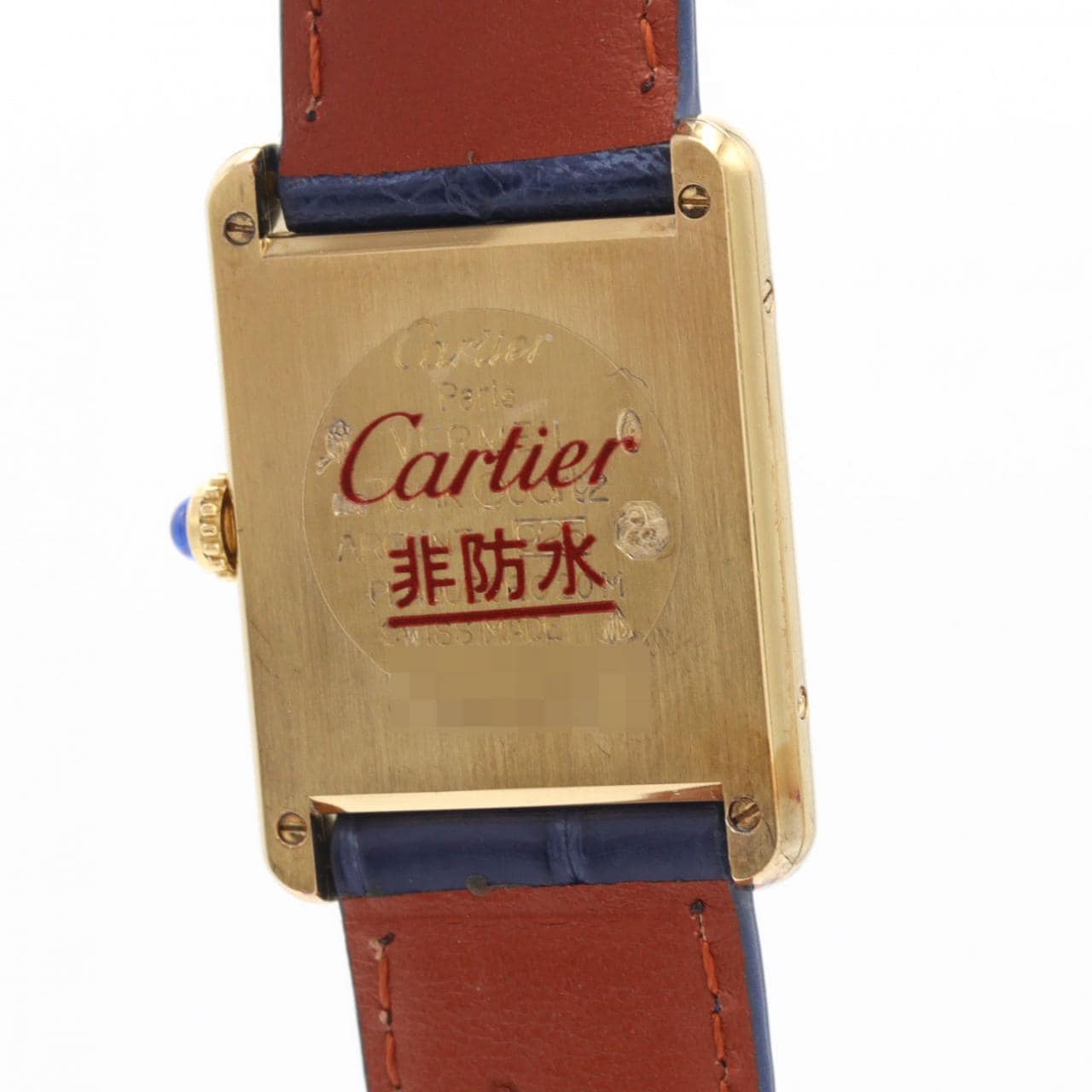 Rectangular gold-tone wristwatch with Roman numeral dial and a leather strap.