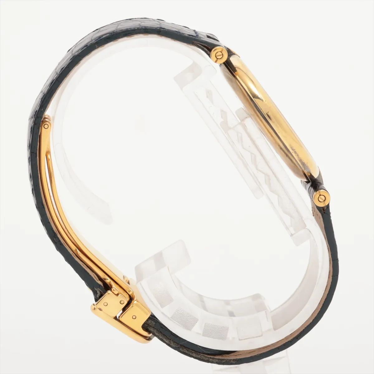 Rectangular-cased watch with silver dial, Roman numerals and a leather strap.