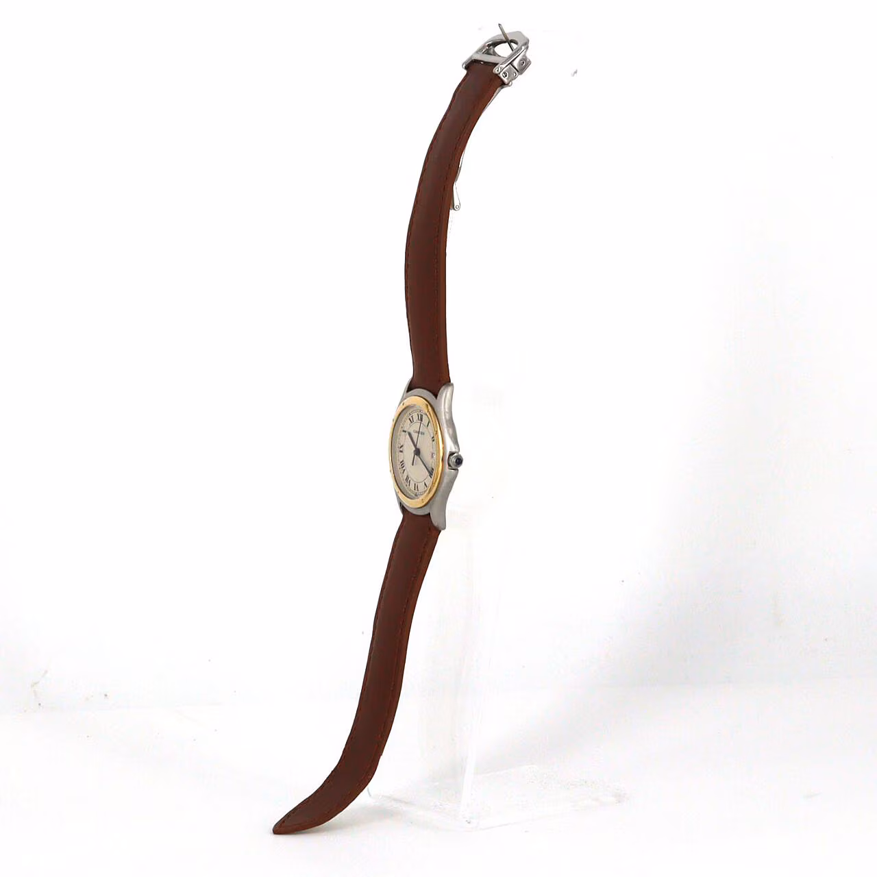 Two-tone steel and gold watch with square dial and link bracelet.