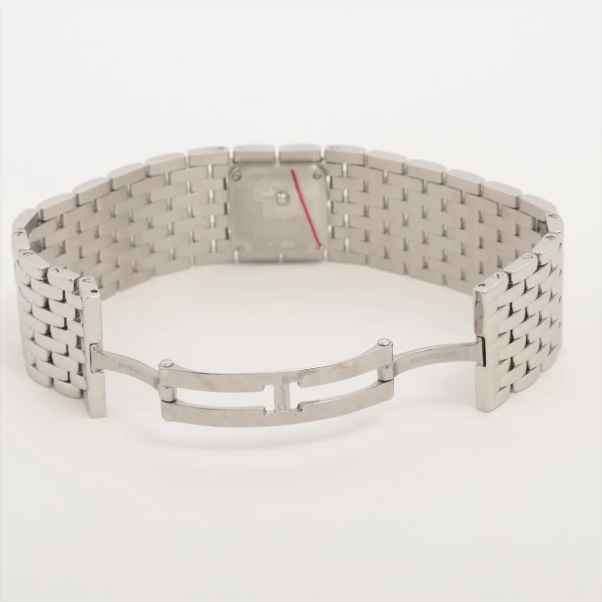Rectangular steel watch with a pale pink iridescent dial and integrated steel bracelet.