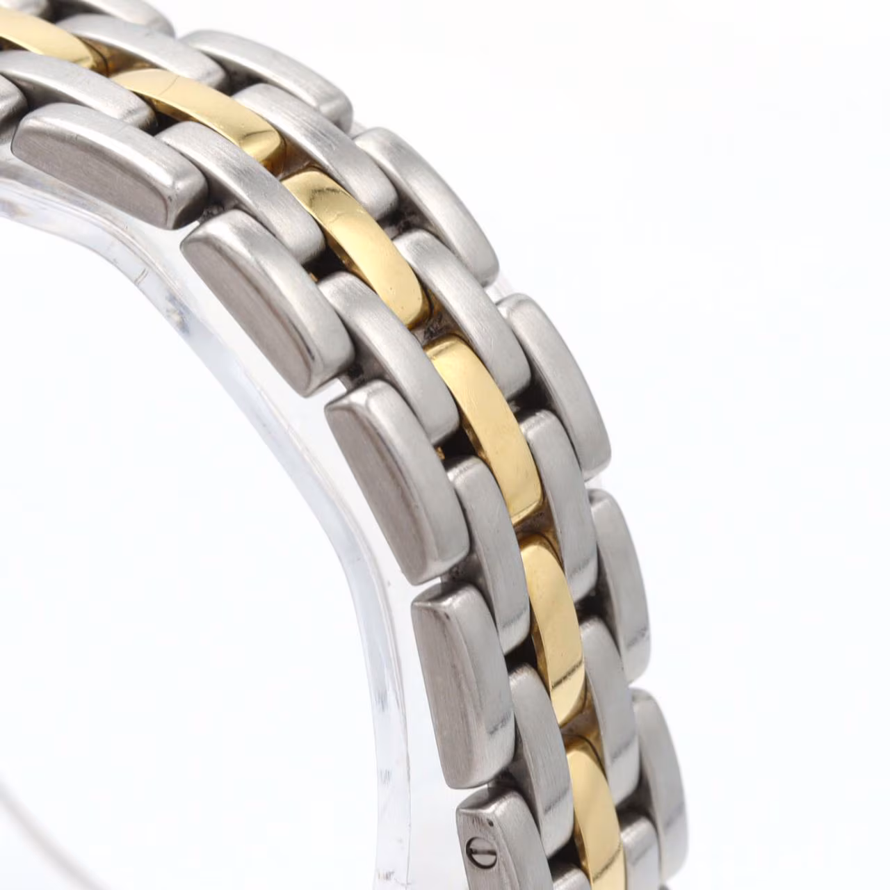 Small two-tone watch with square dial, Roman numerals and steel-and-gold link bracelet.