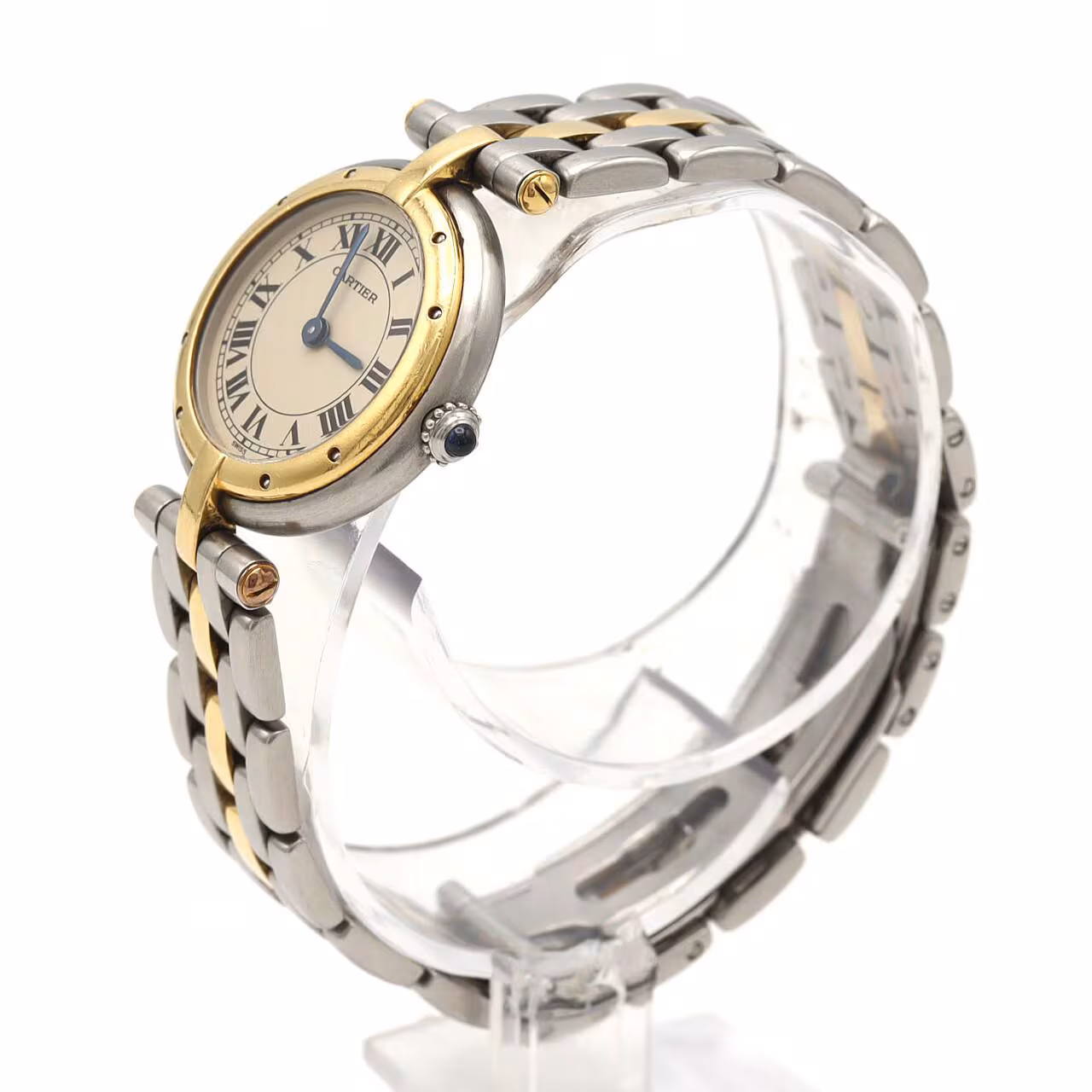 Small two-tone watch with square dial, Roman numerals and steel-and-gold link bracelet.