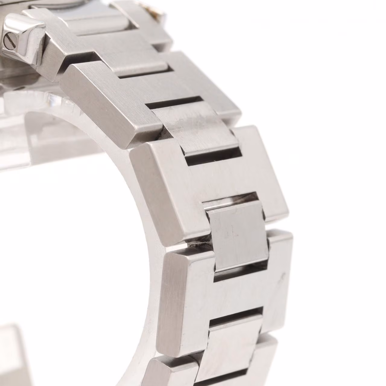 Round steel chronograph watch with screw-down crown cover and steel bracelet.