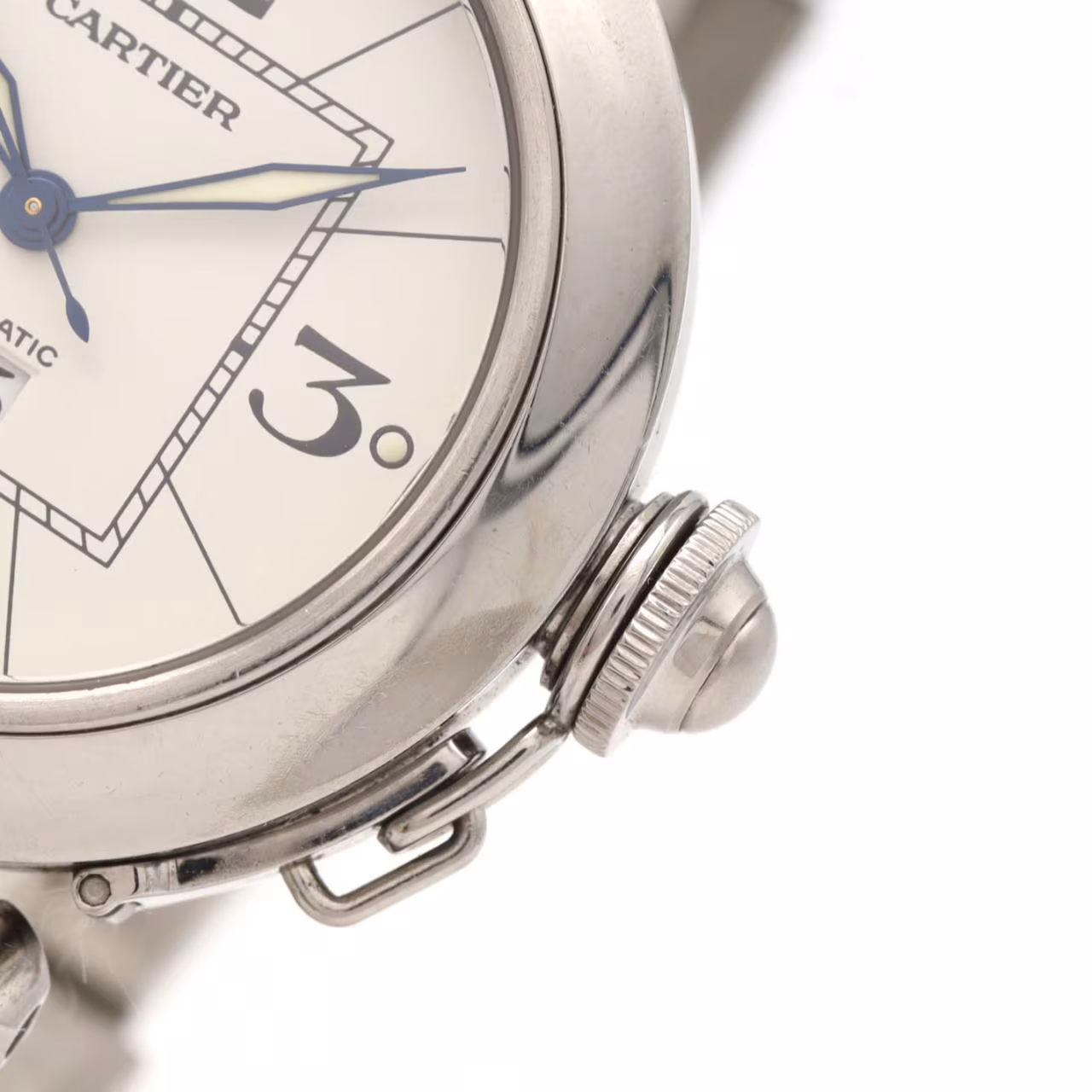 Round steel wristwatch with a white dial, date window and screw-down crown cover on a steel bracelet.