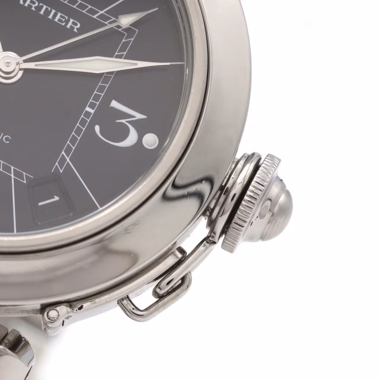 Round steel wristwatch with a screw-down crown cap and steel bracelet.