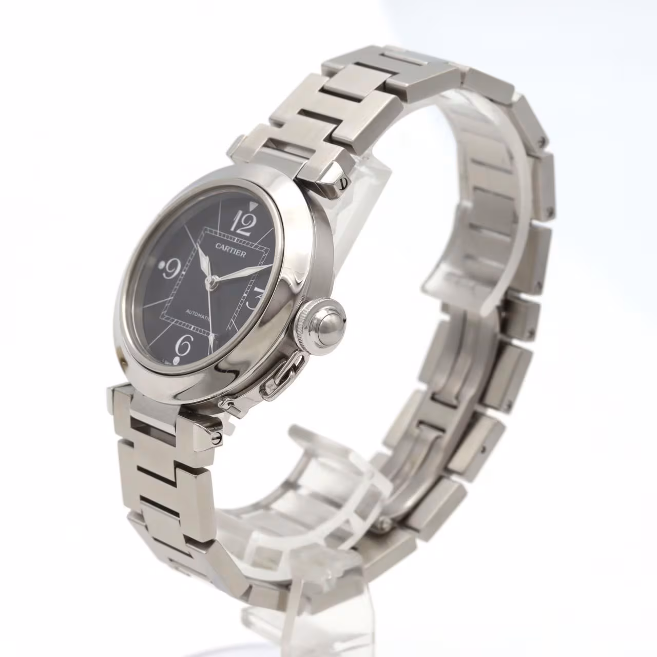 Round steel wristwatch with a screw-down crown cap and steel bracelet.