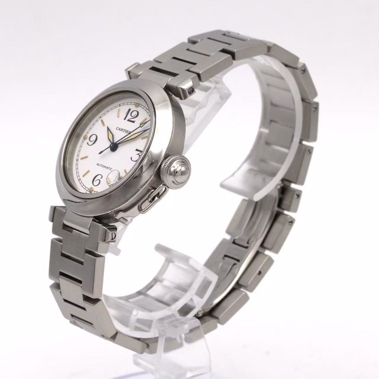 Round steel automatic watch with screw-down crown cover and steel bracelet.
