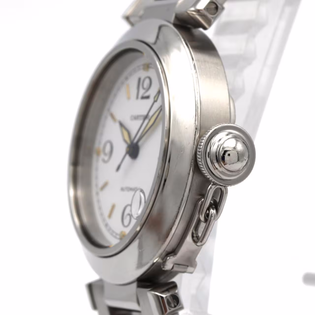 Round steel automatic watch with screw-down crown cover and steel bracelet.