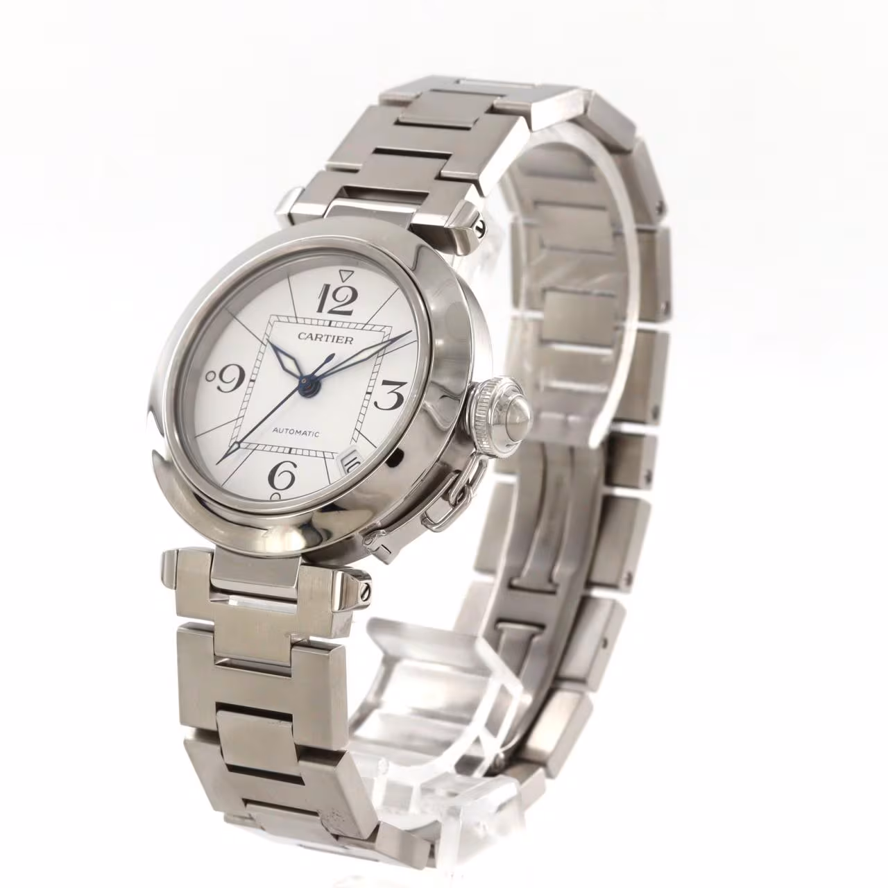 Round steel watch with a screw-down crown cover and steel bracelet.