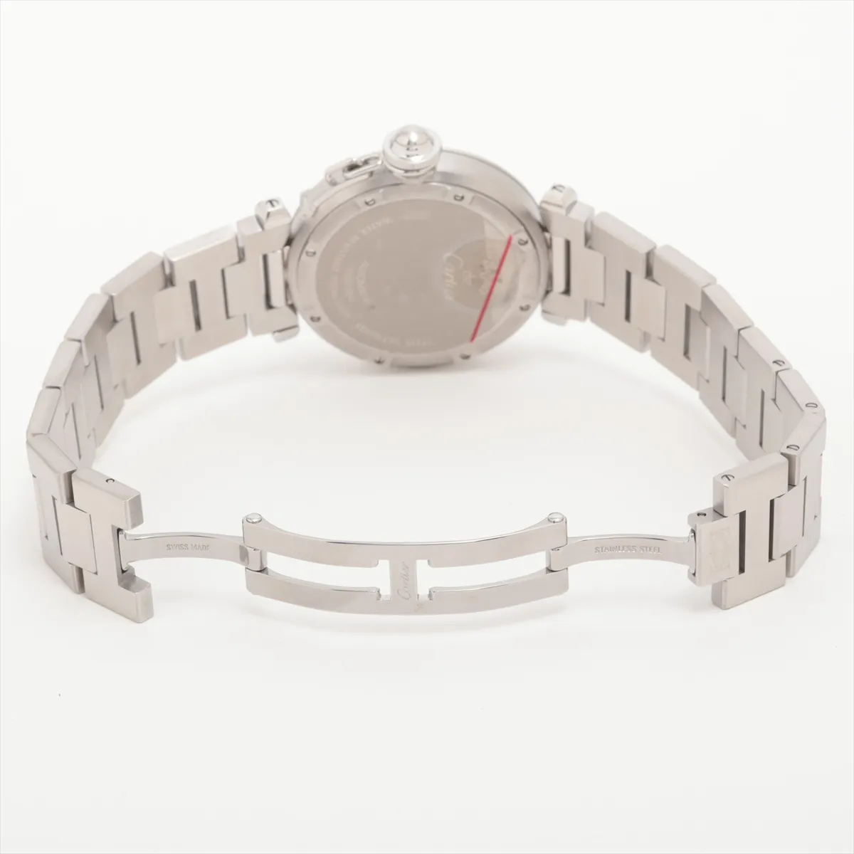Round steel watch with pink dial, Arabic numerals and a steel bracelet.