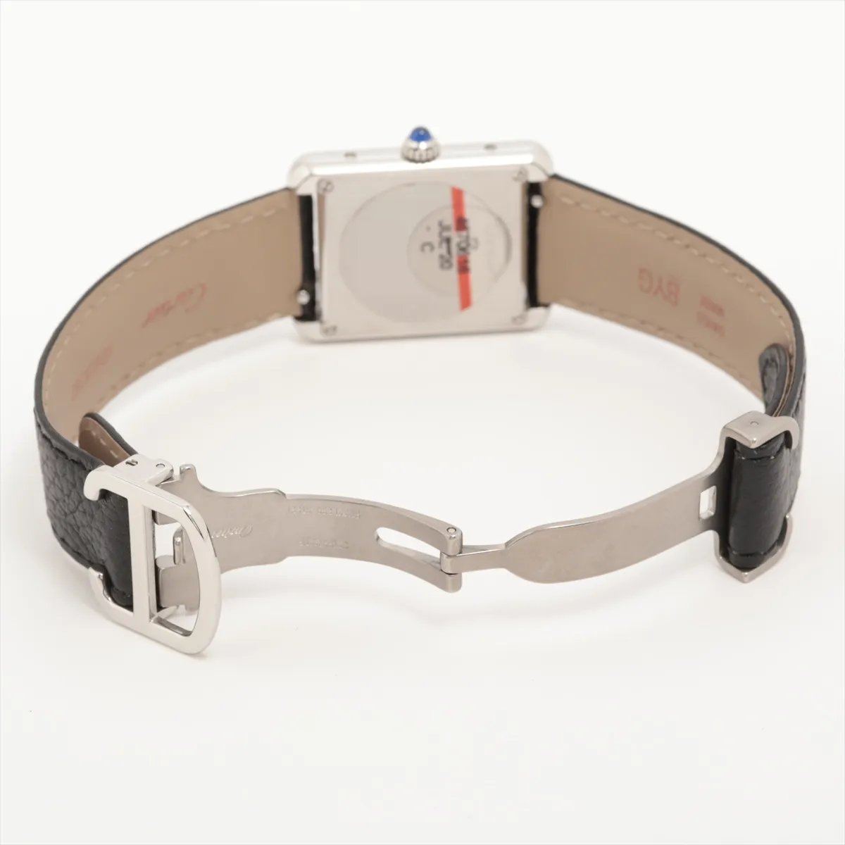 Square-cased wristwatch with white dial, Roman numeral markers and a dark leather strap.