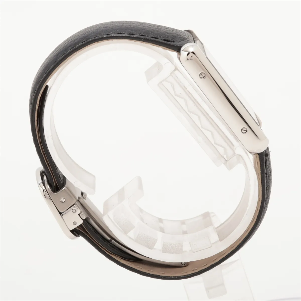 Square-cased wristwatch with white dial, Roman numeral markers and a dark leather strap.