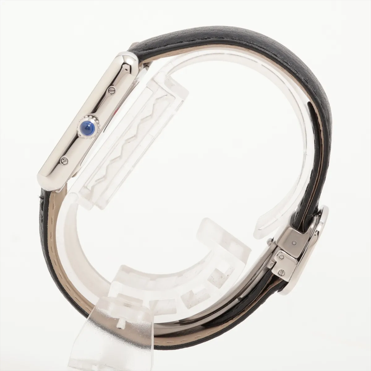 Square-cased wristwatch with white dial, Roman numeral markers and a dark leather strap.