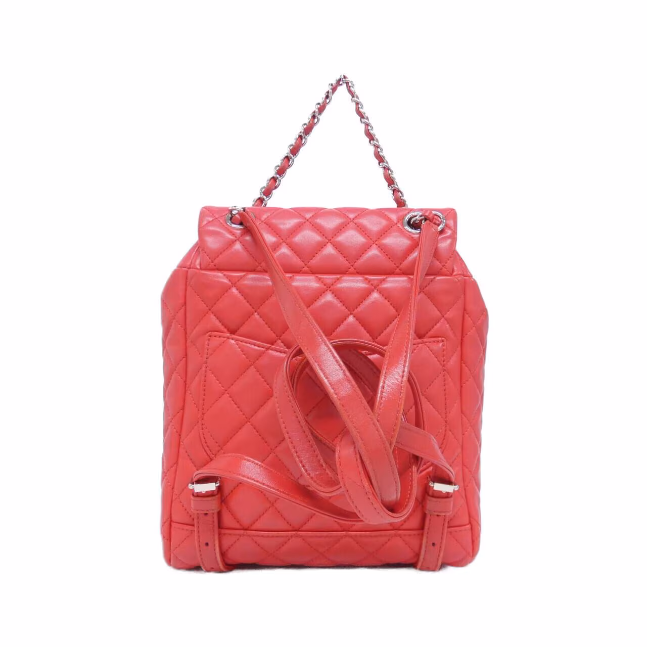 Black quilted backpack with drawstring top, front flap and chain-threaded shoulder straps.