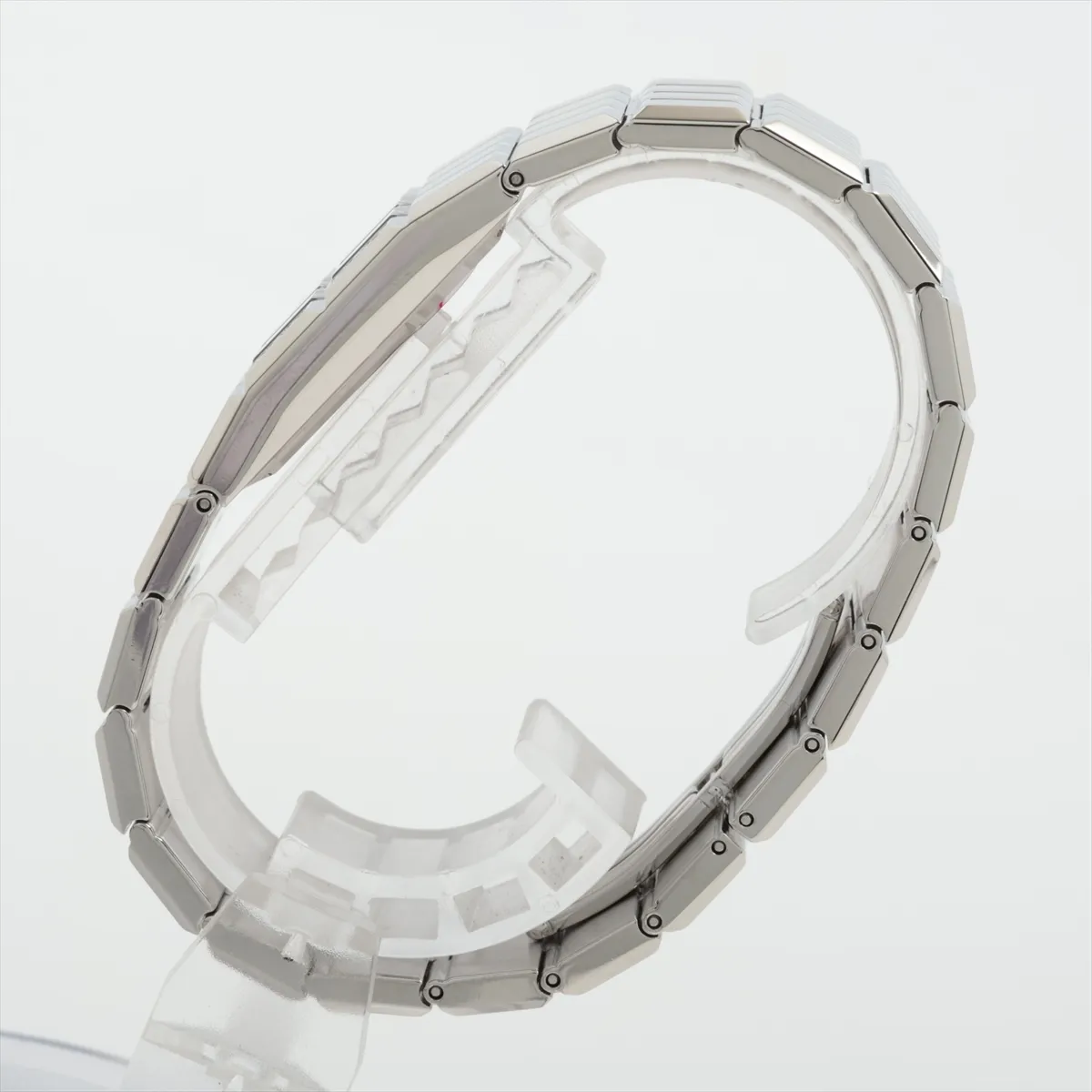 Slim rectangular stainless steel watch with digital display and integrated steel bracelet.
