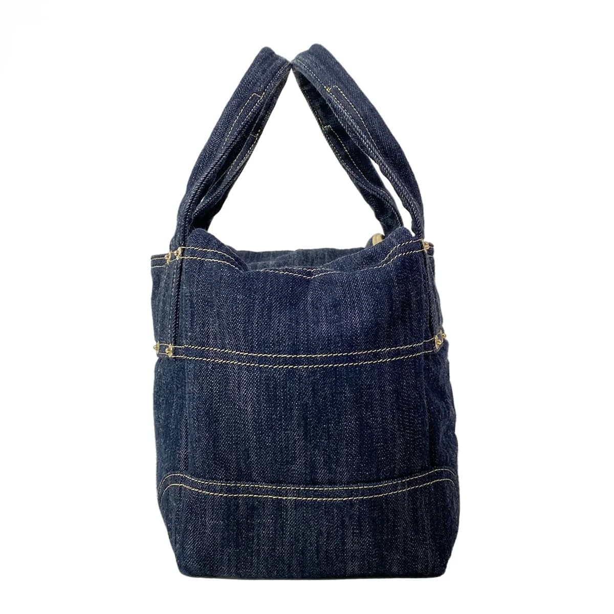 Navy denim handbag with a subtle sparkle in the fabric.
