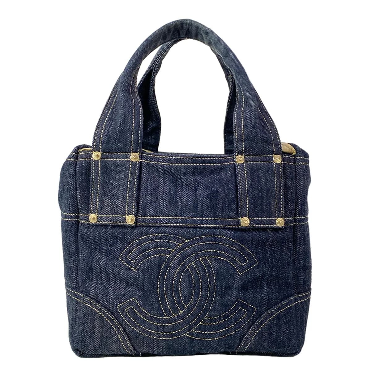 Navy denim handbag with a subtle sparkle in the fabric.