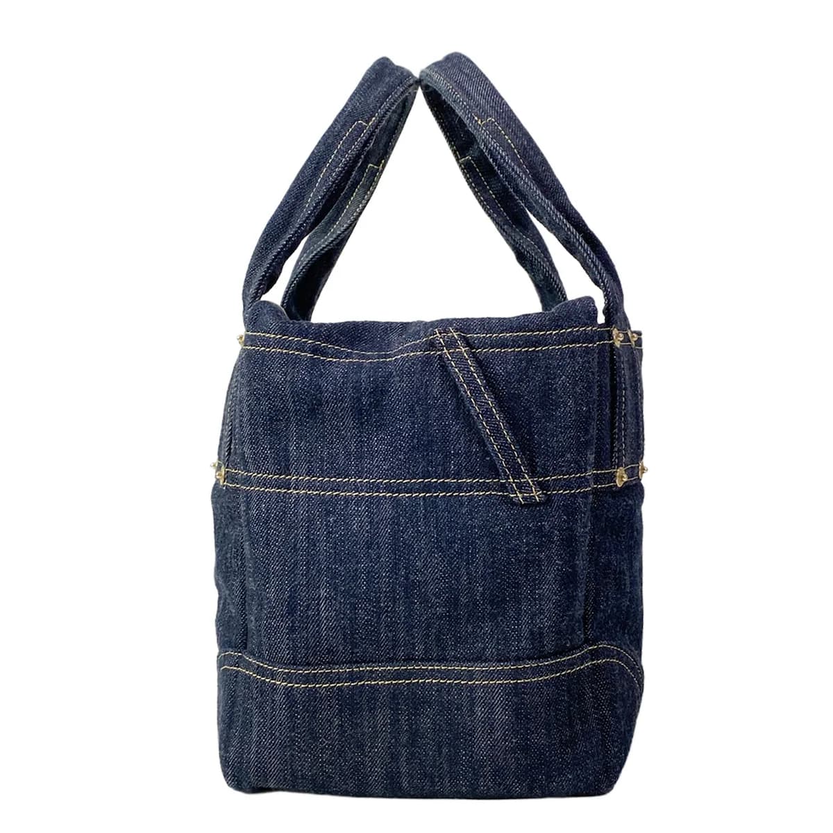 Navy denim handbag with a subtle sparkle in the fabric.