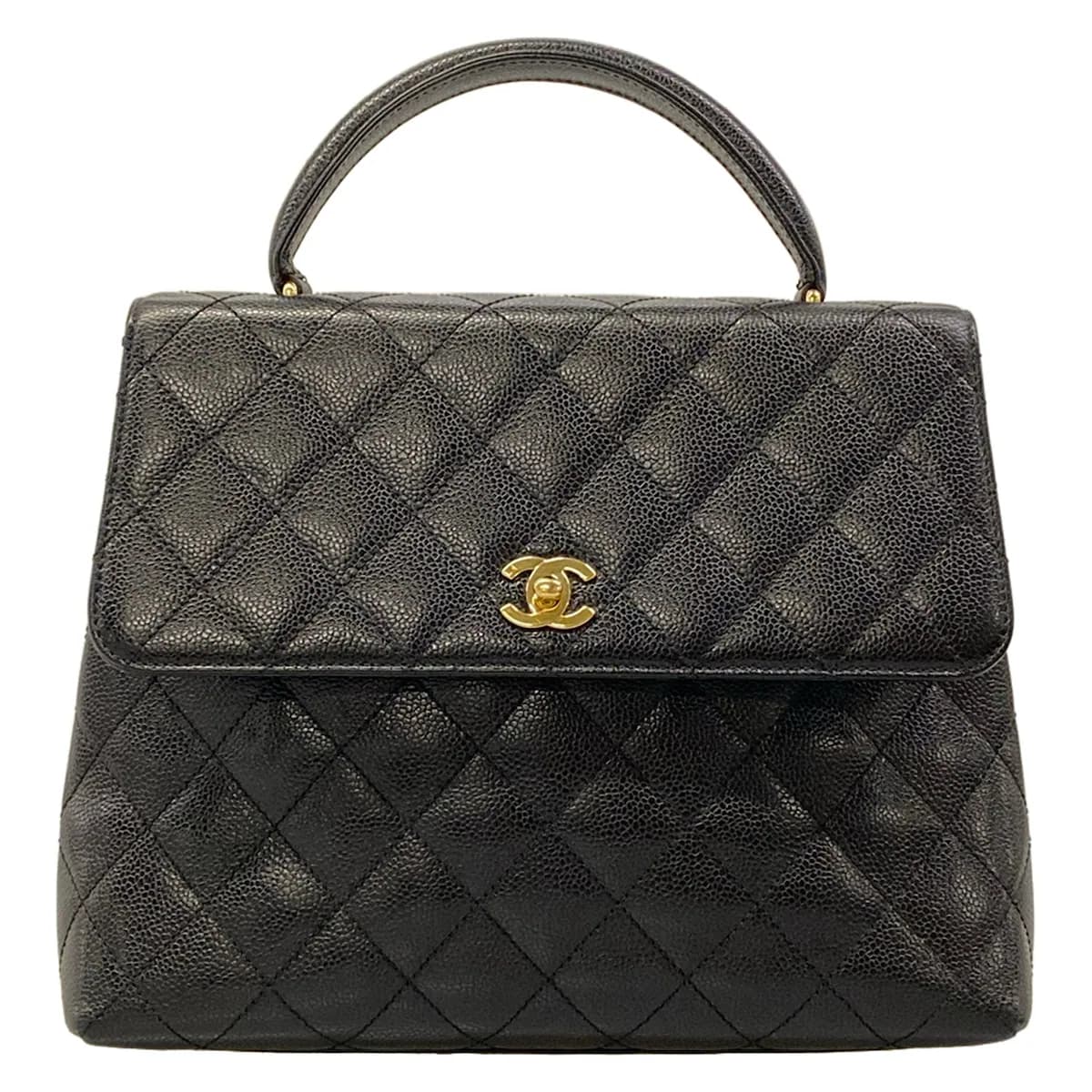 Black quilted bag with a tapered trapezoid silhouette.