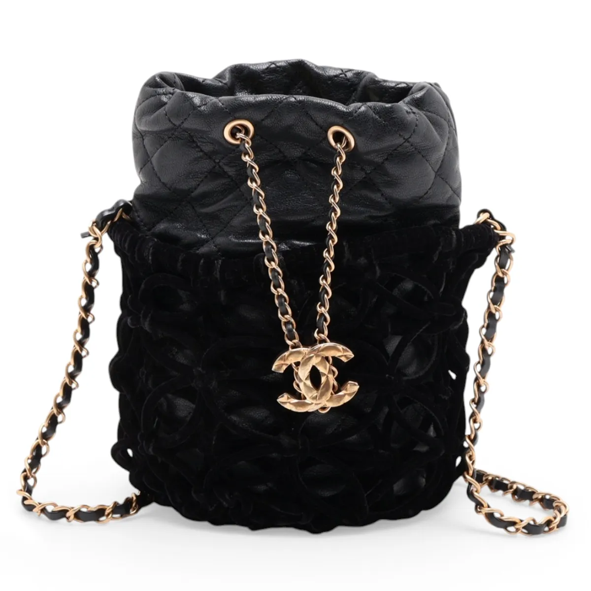Black quilted drawstring bag with a gold chain strap and soft velour panels.
