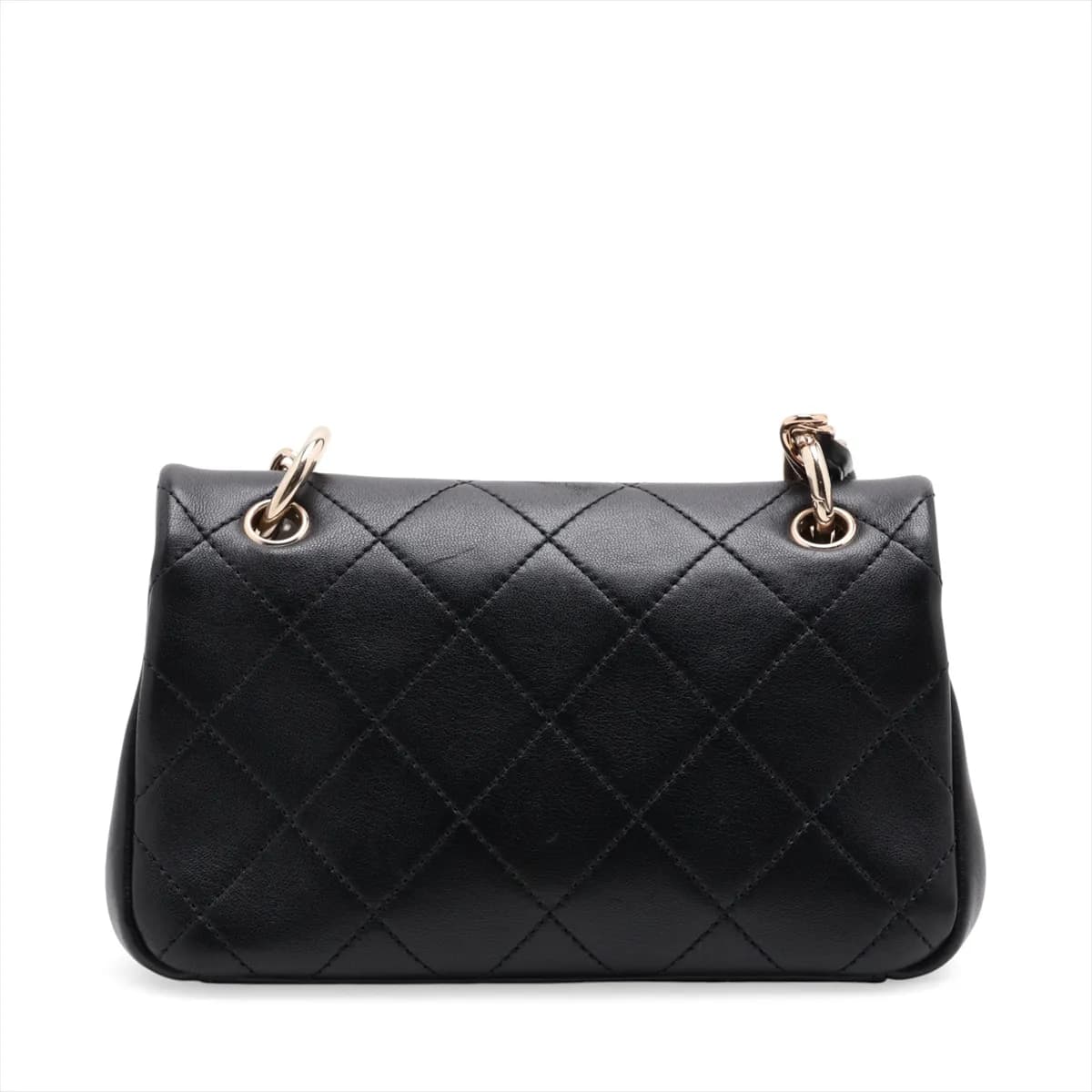 Quilted black leather flap bag with a gold-tone chain strap and turnlock closure
