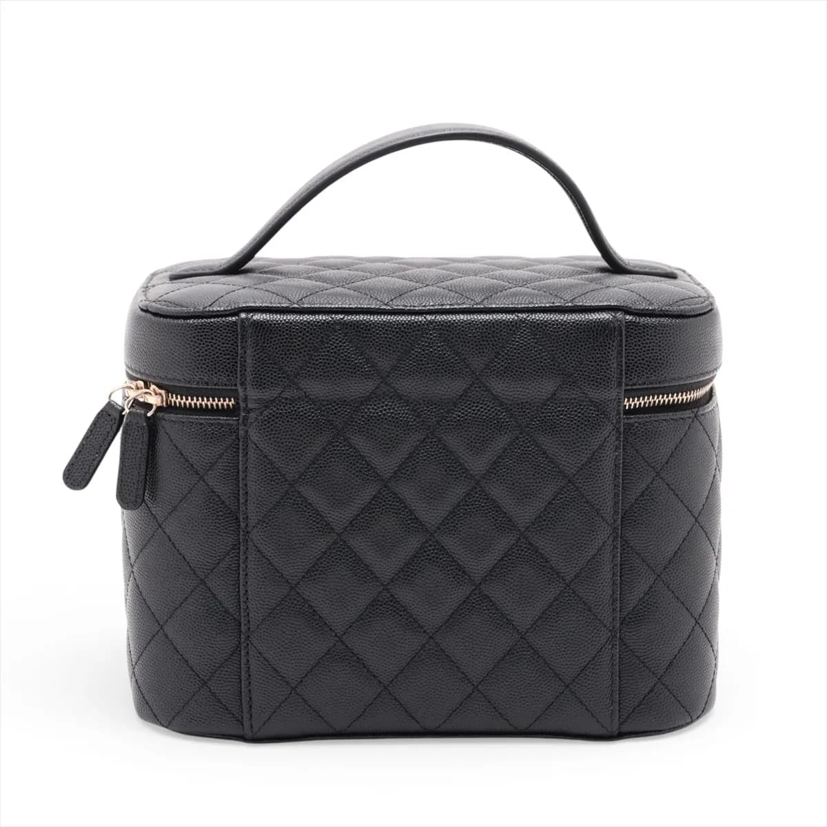 Black quilted caviar leather vanity case with a top handle and gold-tone hardware.