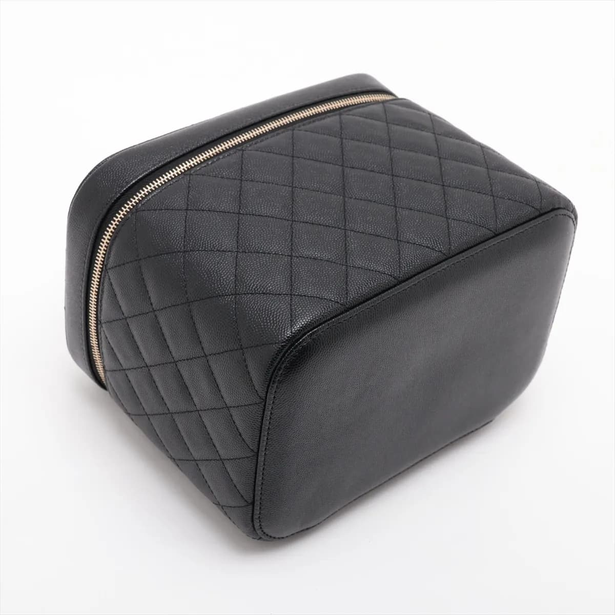 Black quilted caviar leather vanity case with a top handle and gold-tone hardware.