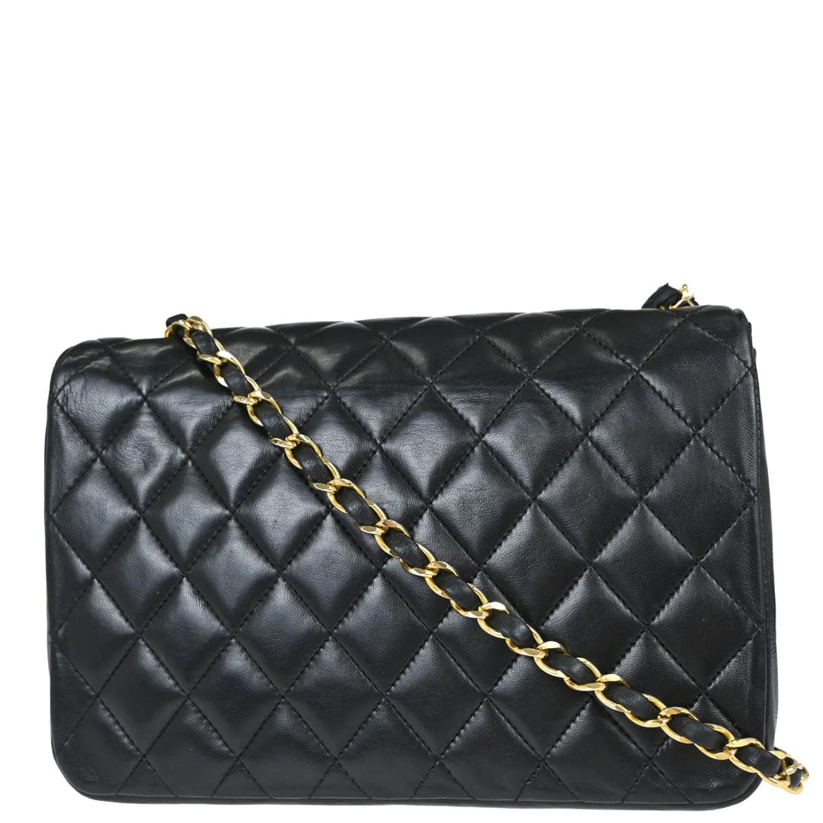 Black quilted lambskin flap bag with interwoven chain-and-leather strap and a logo clasp