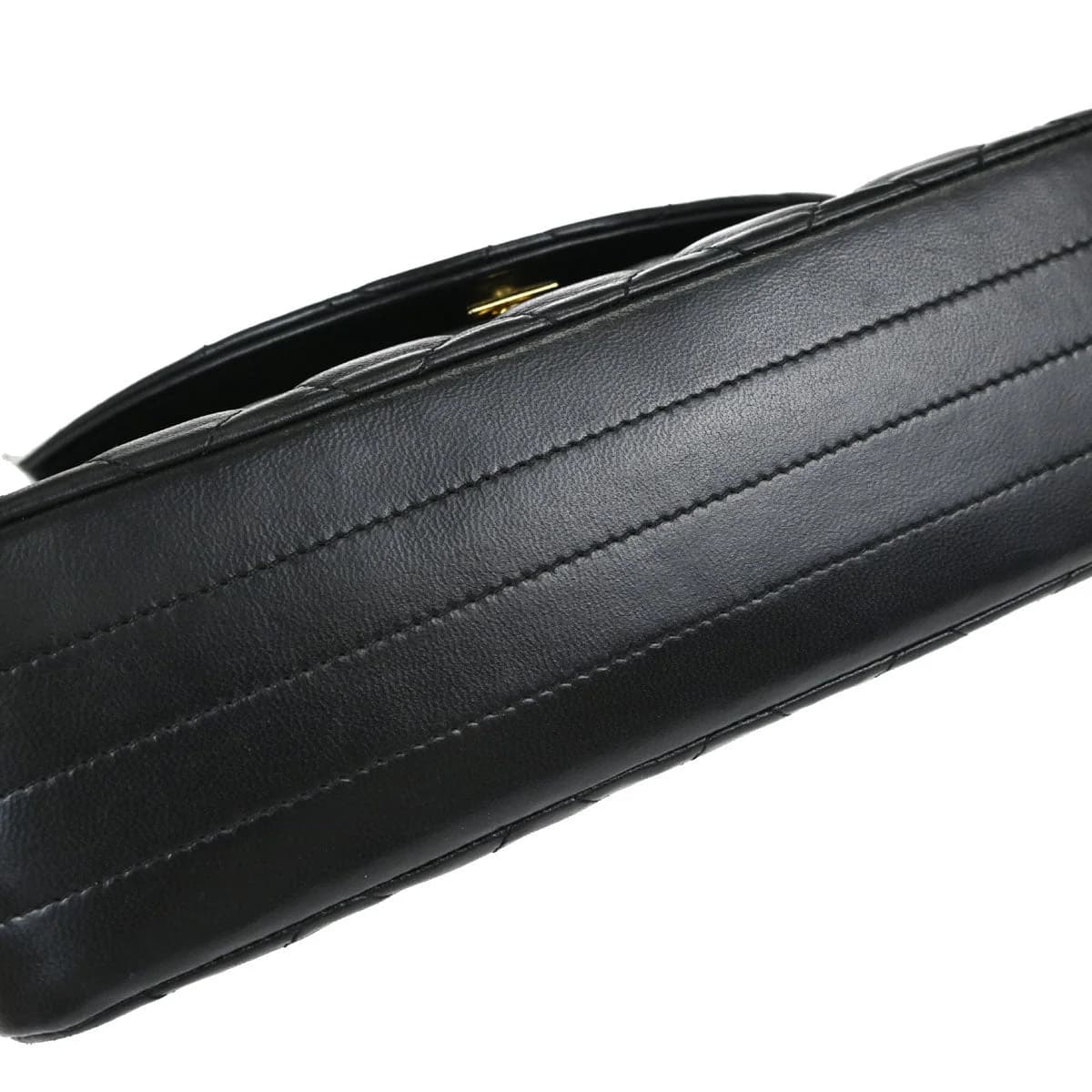 Black quilted lambskin flap bag with interwoven chain-and-leather strap and a logo clasp