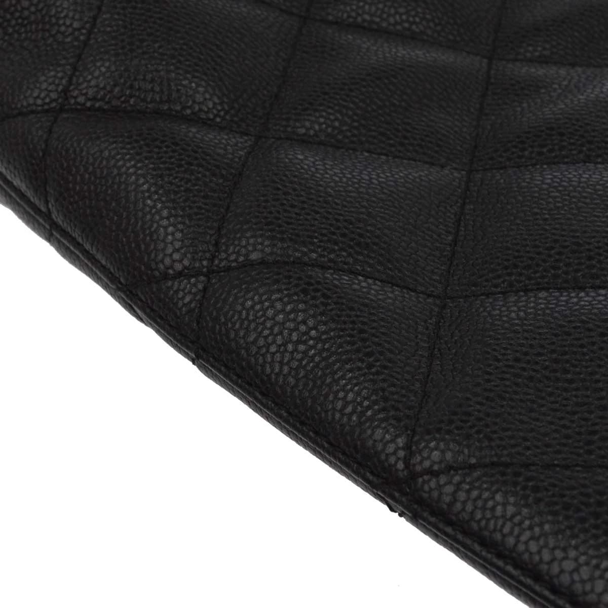 Black grained-leather tote with chain-and-leather shoulder straps.