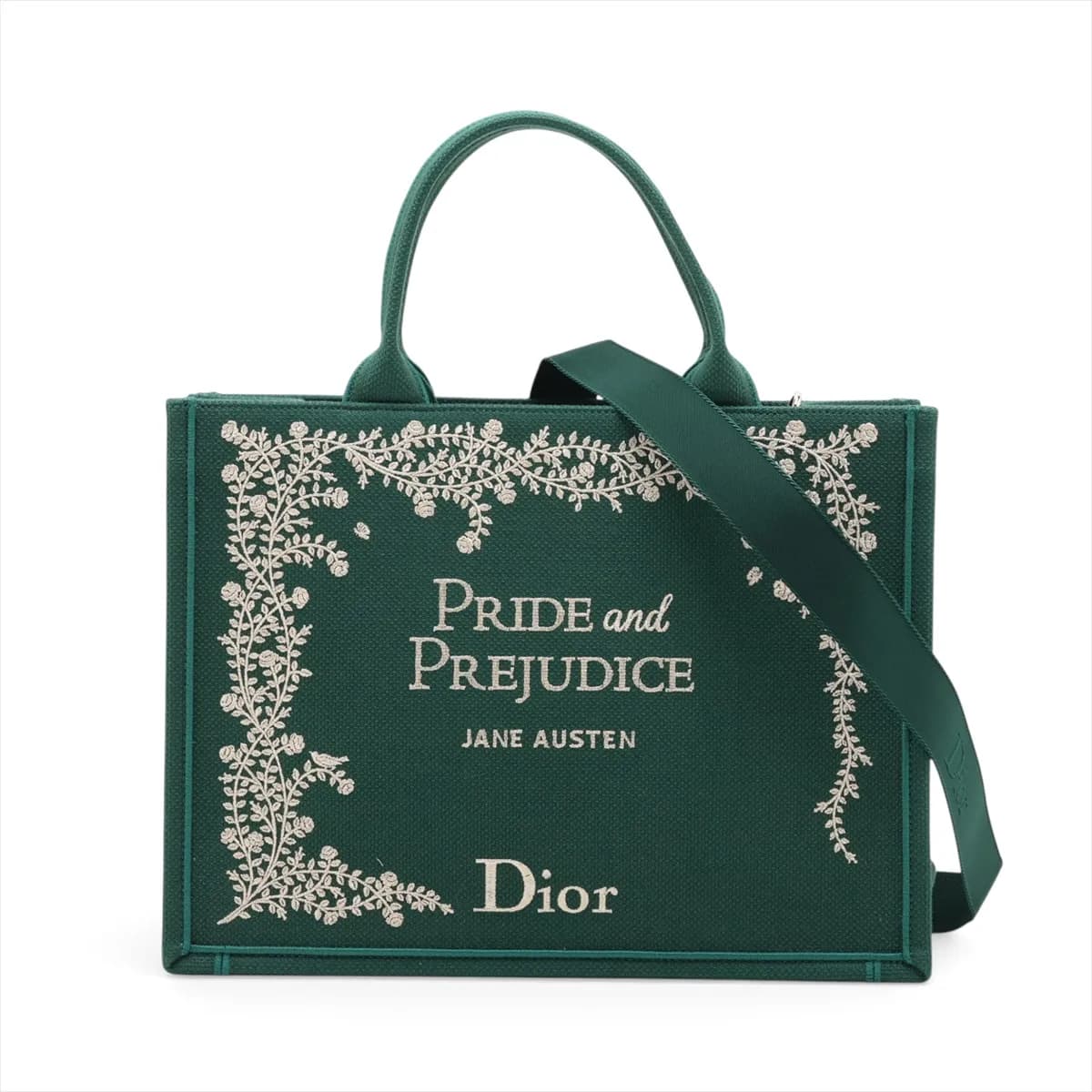 Green patterned canvas tote with star motifs, flat handles and detachable strap.
