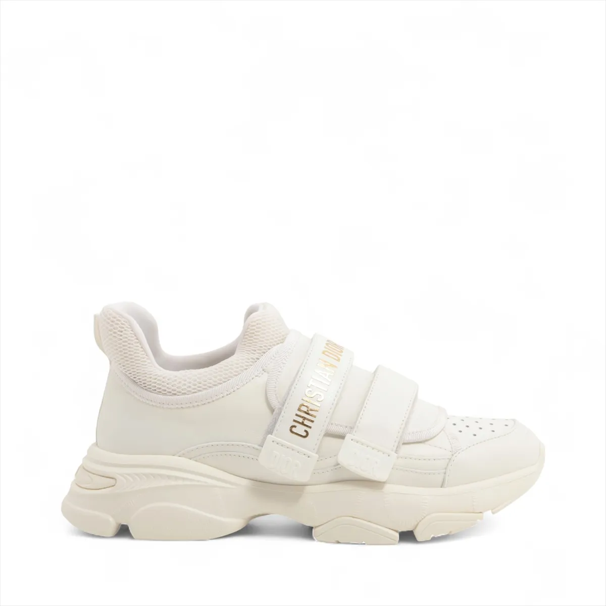 White sneakers with chunky ridged soles, photographed side on