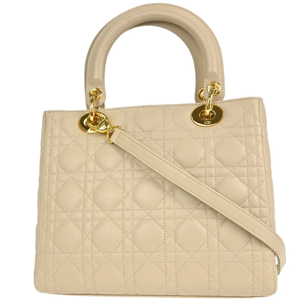 Beige quilted lambskin bag with top handles and hanging charms.