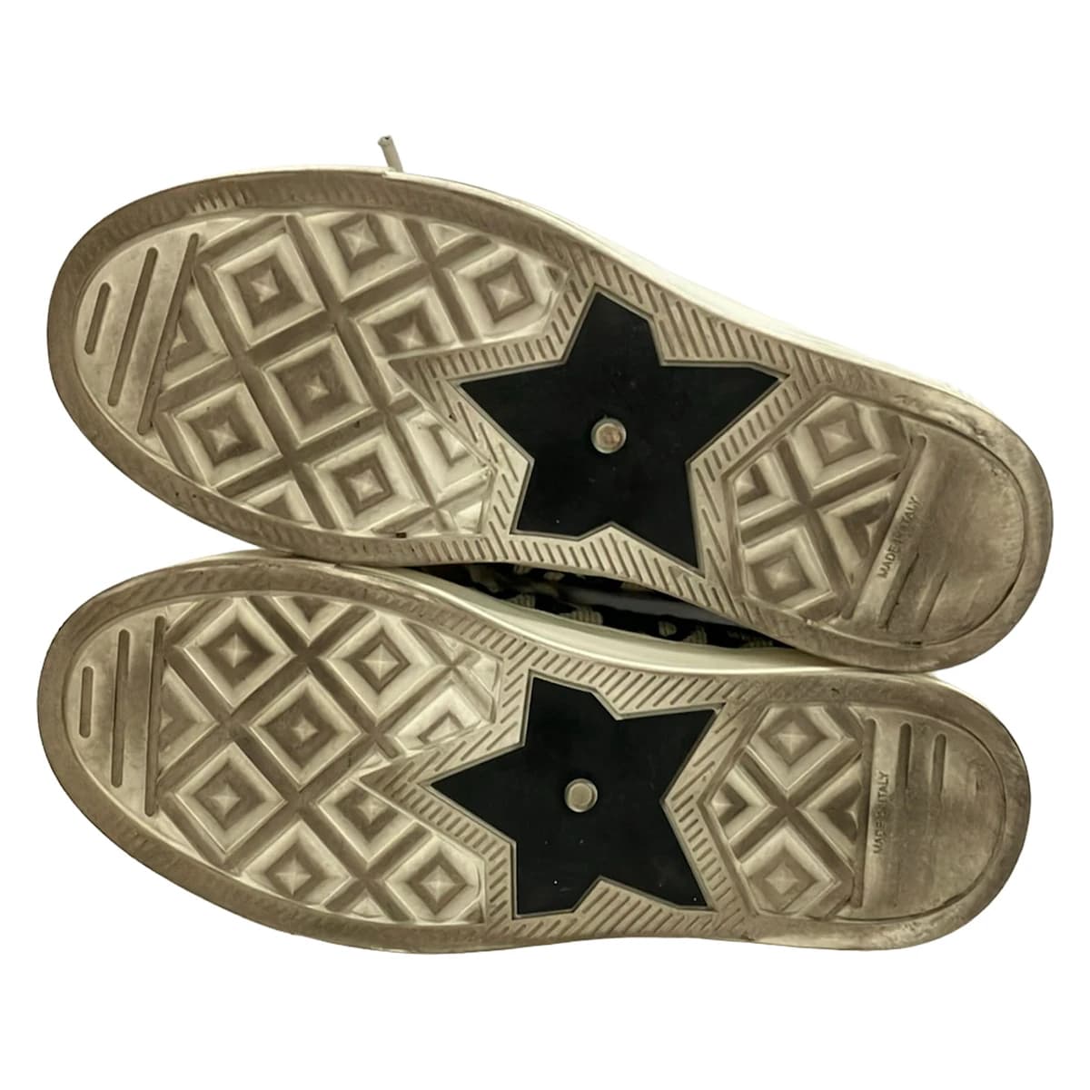 Pair of low-top trainers photographed against a plain background.
