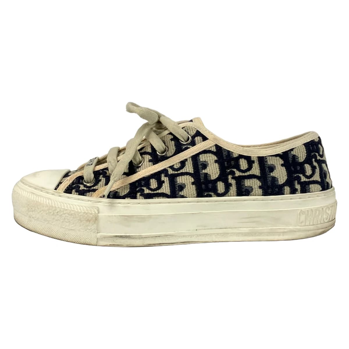 Pair of low-top trainers photographed against a plain background.