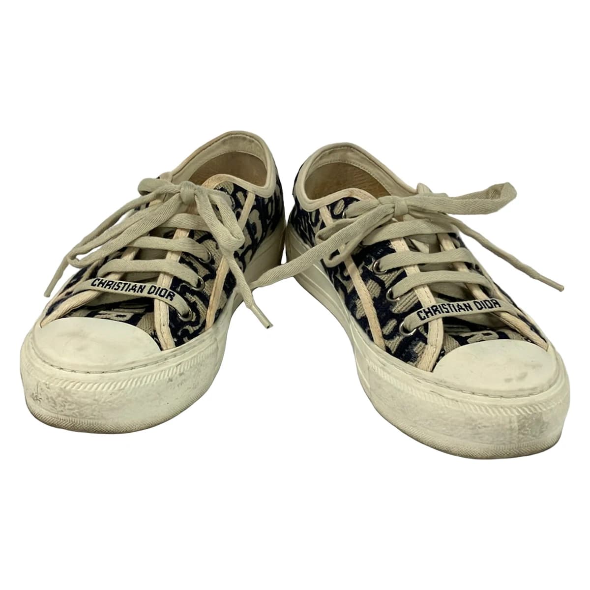 Pair of low-top trainers photographed against a plain background.