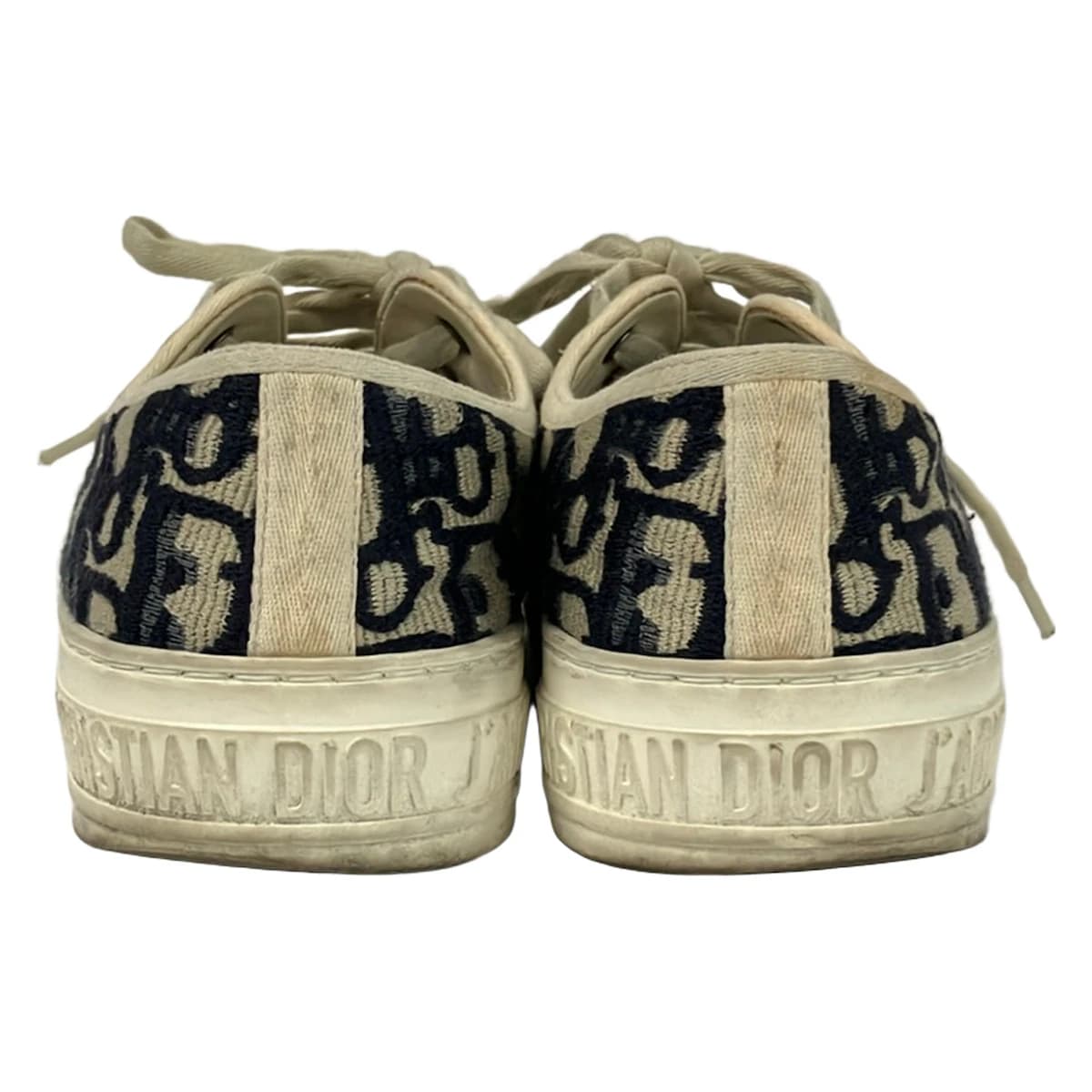 Pair of low-top trainers photographed against a plain background.