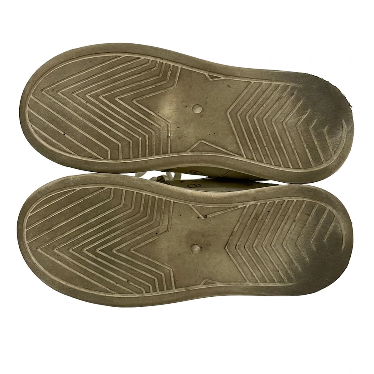 Pair of low-top trainers photographed against a plain background.