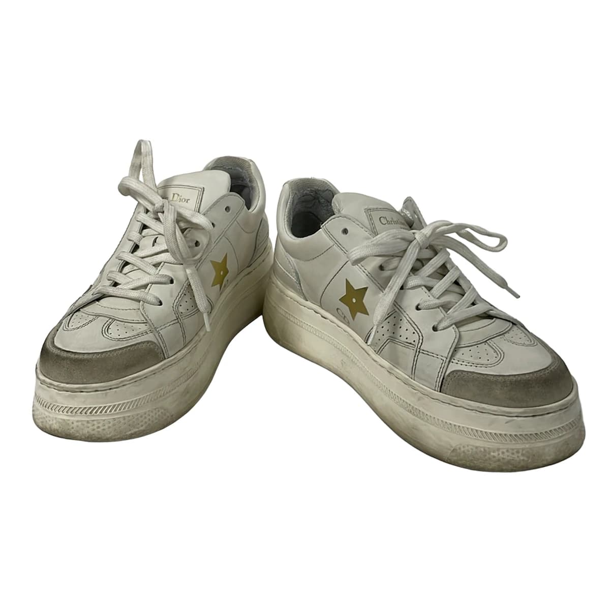 Pair of low-top trainers photographed against a plain background.