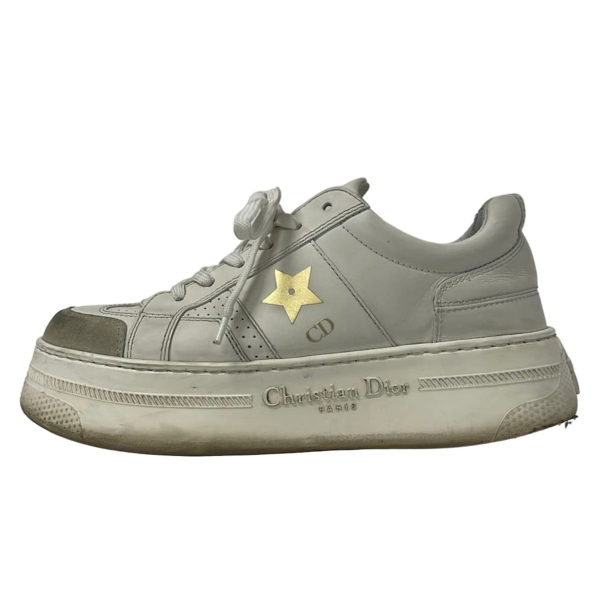 Pair of low-top trainers photographed against a plain background.